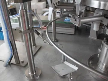 Rotary Vacuum Filling and Sealing Machine